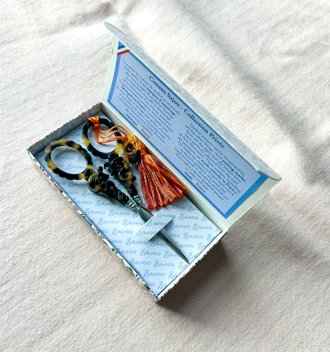 Discover Maison Sajou Tortoiseshell Embroidery Scissors in box, handcrafted in France with elegant tortoiseshell-style handles and precision steel blades for stitching.